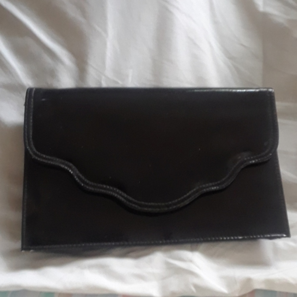 Black patent leather clutch handbag